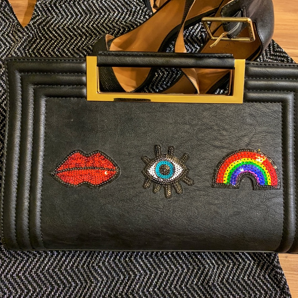 Multifaceted clutch🌈💋👁